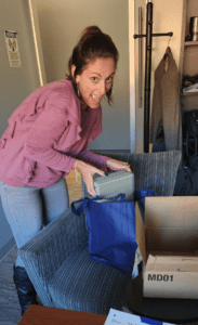 Woman enjoys packing disk drives